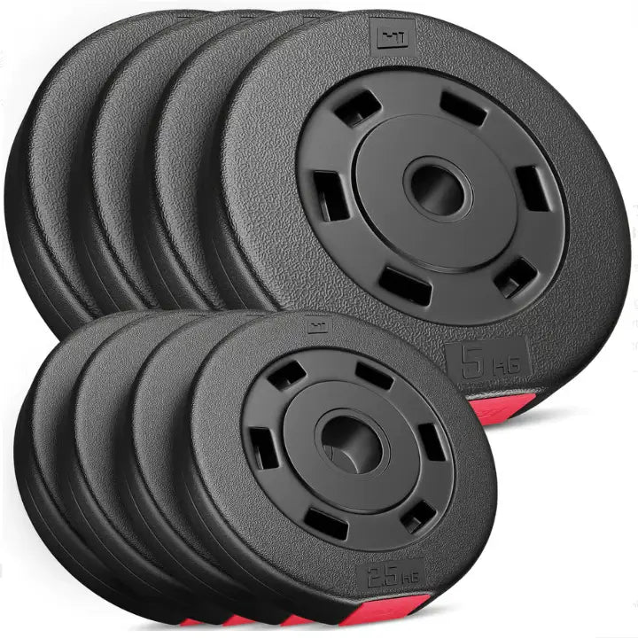 Vektplater til treningsbenk, fire svarte skiver i ulike størrelser med matt finish og tydelige vektmarkeringer.