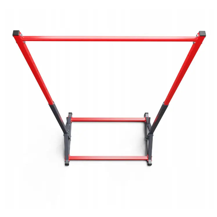 Treningsstang stasjonær, oversiktsbilde av rødt og svart metallstativ med skrå sidearmer og rektangulær base.
