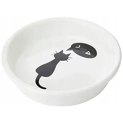 Trixie 24499 keramisk kattematskål, hvit med sort katt- og fiskemotiv i bunnen, sett ovenfra.