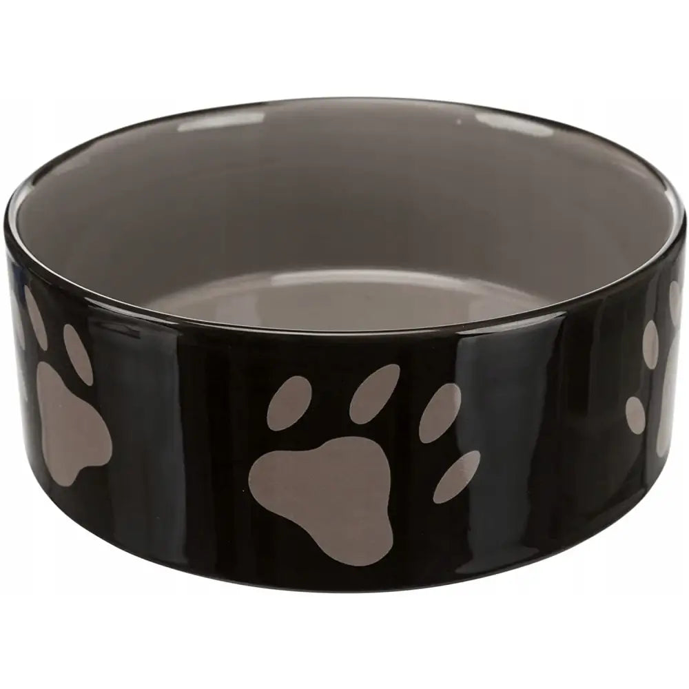 Trixie keramisk hundeskål 1,4L, svart med lysegrå poteavtrykk og grå innside, sett fra skrå vinkel.