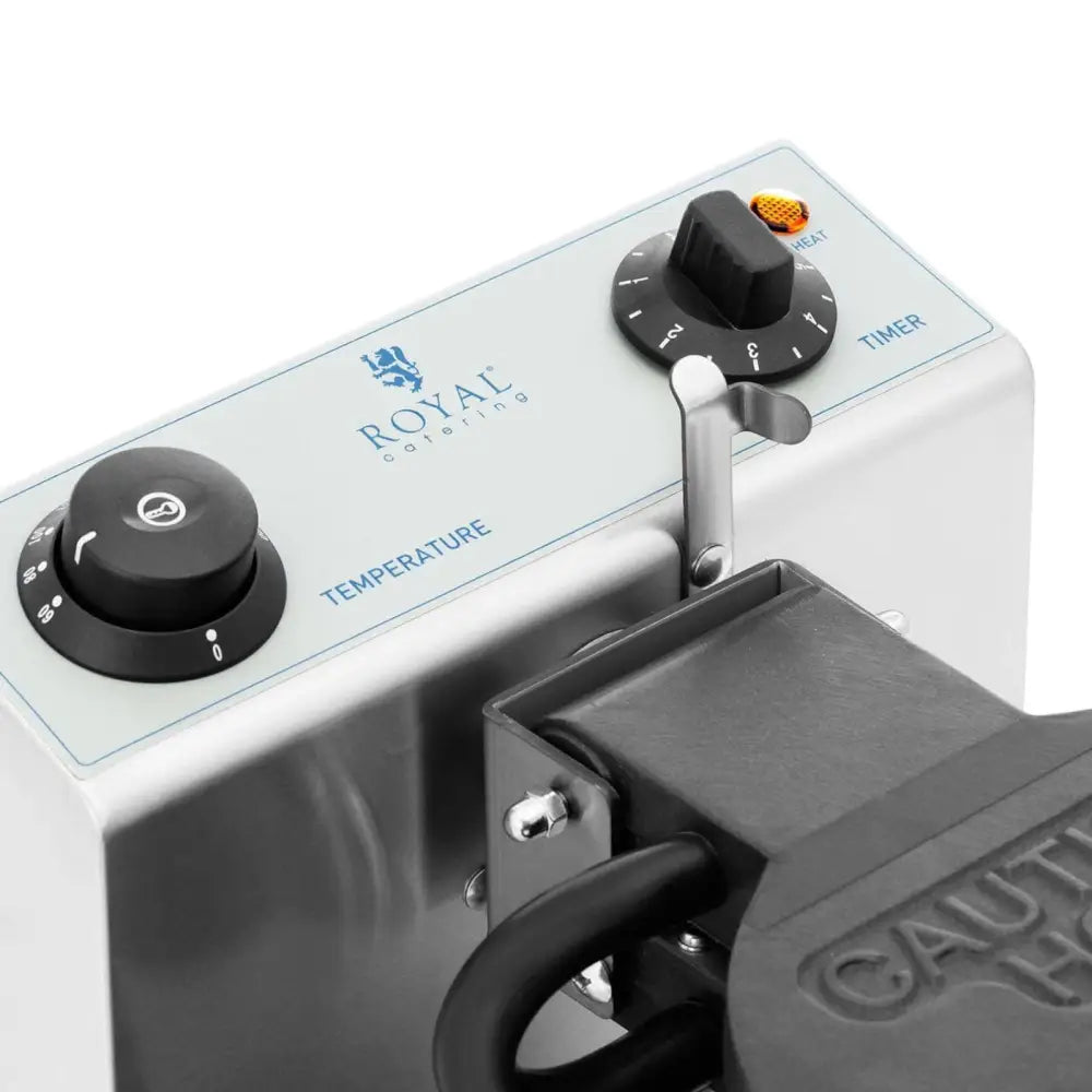 Vaffeljern boble 17 cm, nærbilde av kontrollpanel med sorte dreieknapper, håndtak og varsellampe.