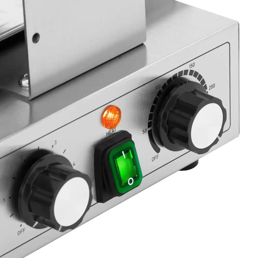 Kontrollpanel på Boble Dobbel Bubble Waffle vaffeljern med to dreieknapper, grønn bryter og indikatorlys.