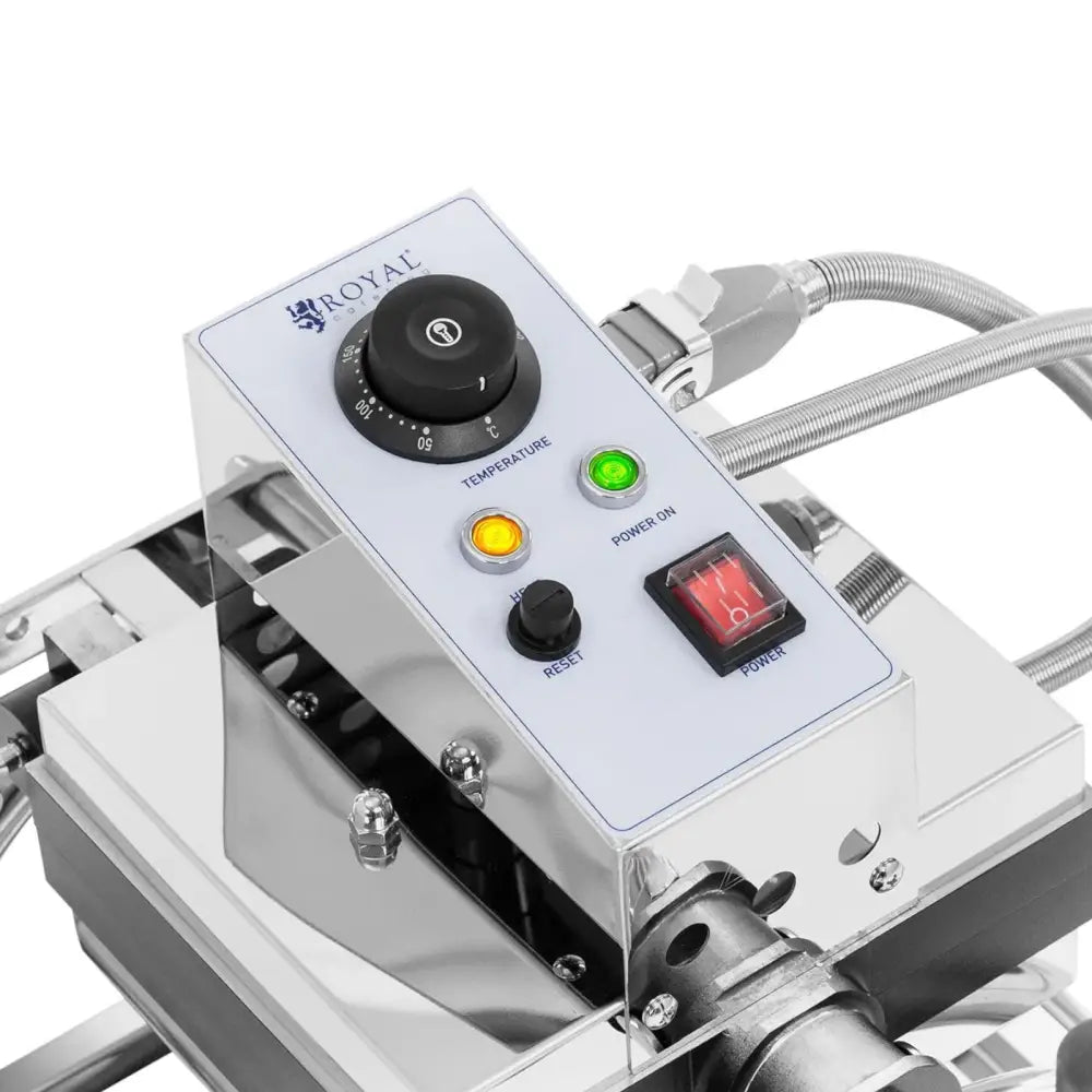 Vaffeljern kontrollpanel, nærbilde av sølv og hvit front med fargede knapper, temperaturbryter og lysindikatorer.