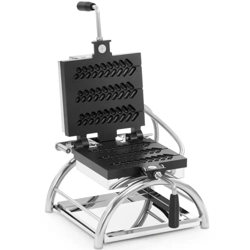 Vaffeljern med roterende plater, skråvisning som fremhever riflet mønster og solid metallhåndtak.