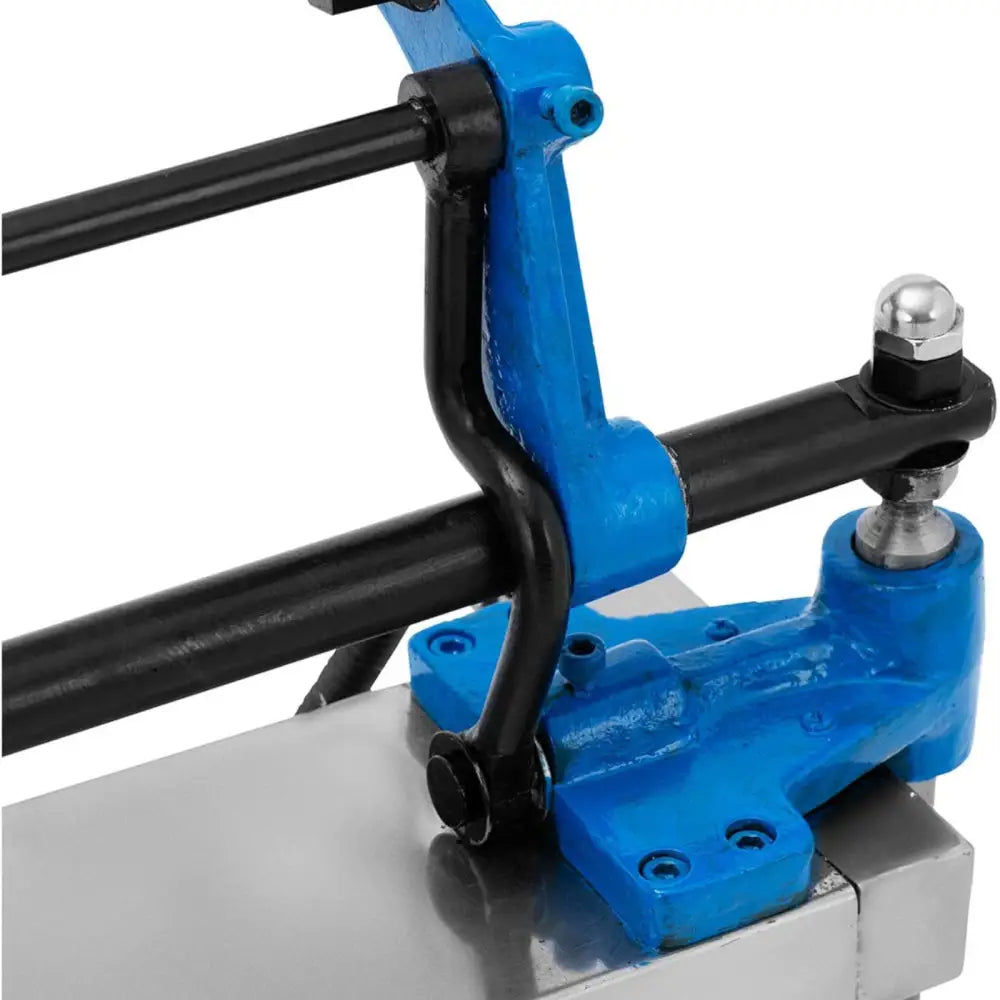 Vaffelpresse for iskremkjeks, nærbilde av blå og svart maskinkomponent med detaljerte bolter og bruksoverflate.