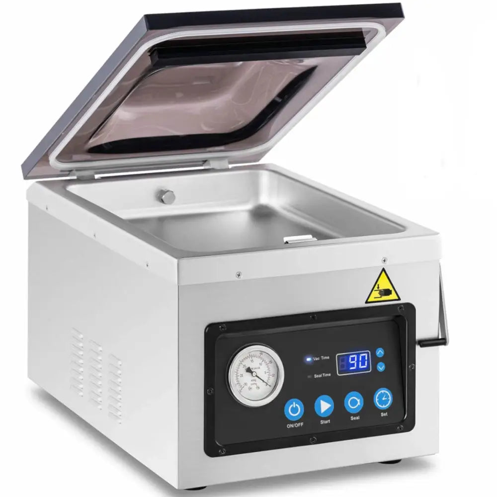 Vakuumkammermatemaskin med åpent lokk, viser kontrollpanel med trykkmåler, digital skjerm og blå knapper.