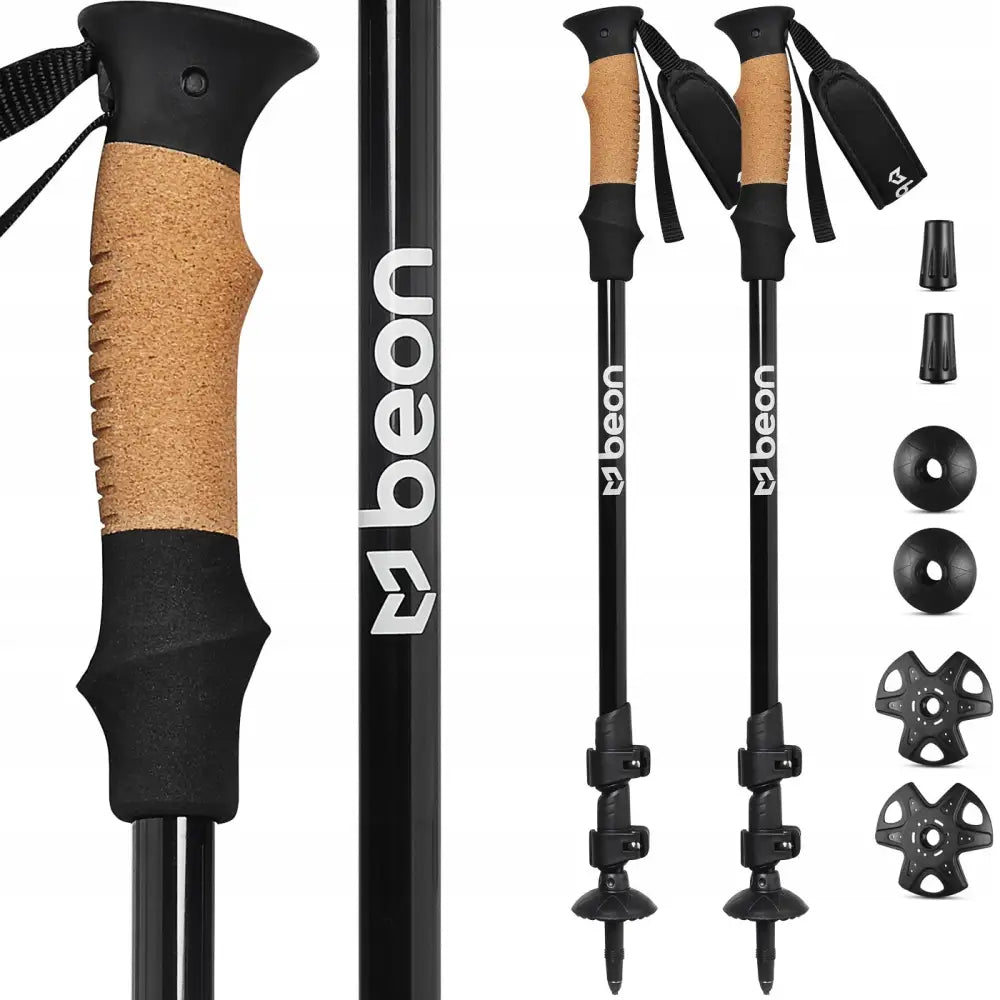 Vandrestaver fra Beon med korkhåndtak, vist med trinser, gummitupp og tydelige hvite logoer.