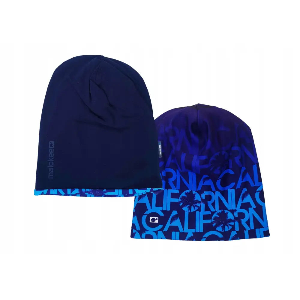 Varm termoaktiv vendbar vinterlue, mørkeblå og mønstret variant vist forfra med sømdetalj og sideetikett.