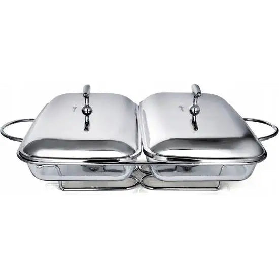 Varmeholder for mat med telys, sett forfra med to stållokk, glassinnsats og buede metallhåndtak.