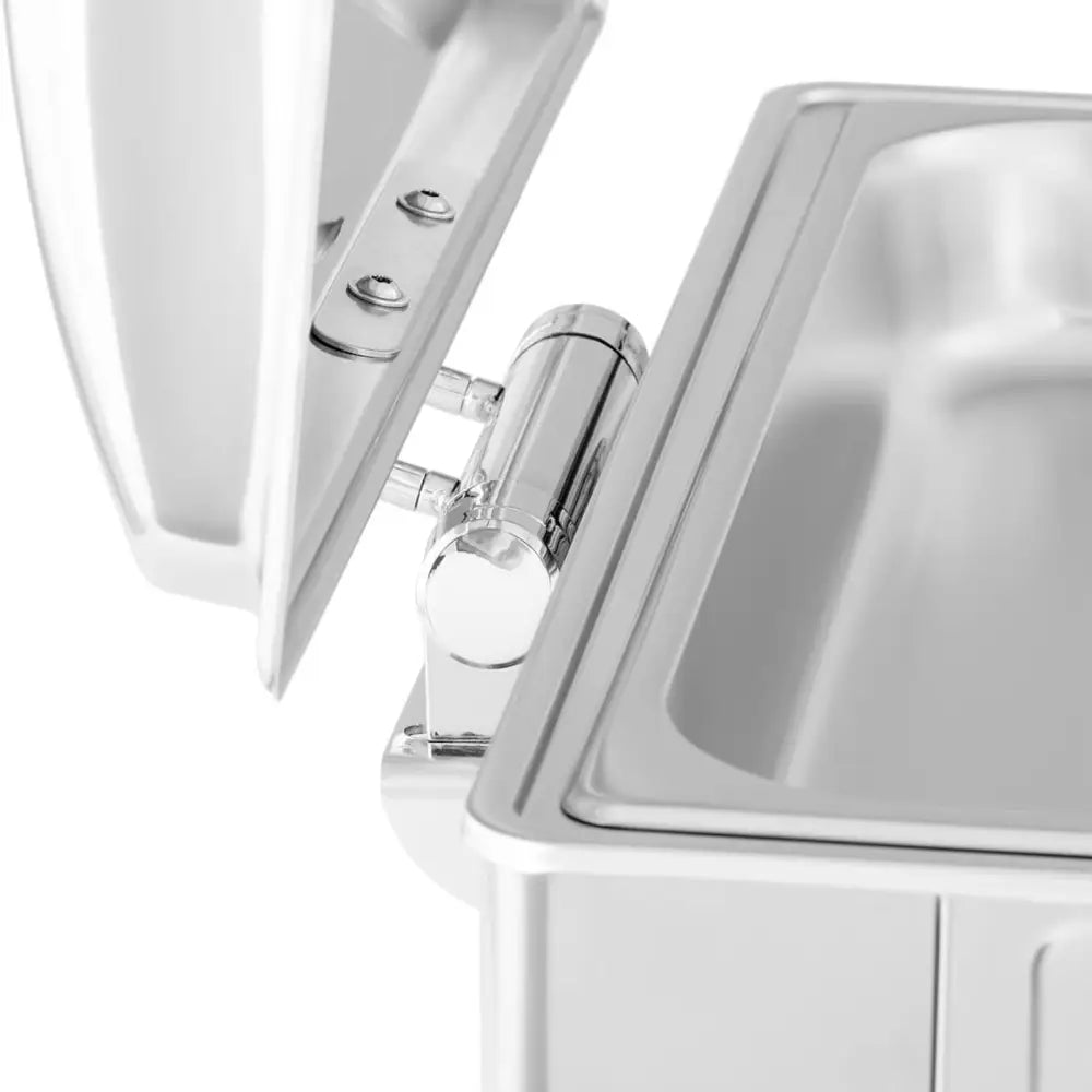 Varmematbeholder GN 1/1, nærbilde av rustfritt hengslet lokk med synlig hengselsdetalj og beholderkant.