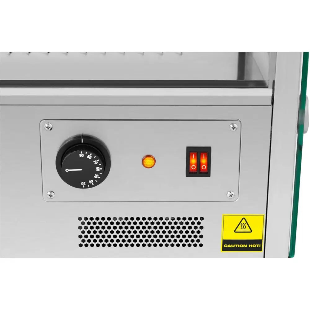 Kontrollpanel for varmepresentasjonsdisk, viser sort temperaturbryter, belyste brytere og gul advarselsmerke.