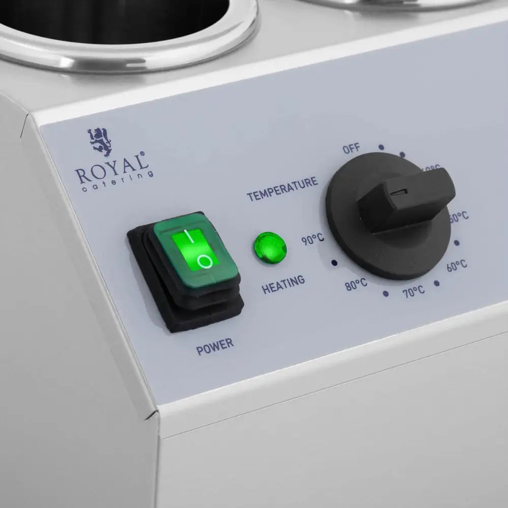 Varmesausflasker, detaljert nærbilde av kontrollpanelet med justerbar temperatur og grønne brytere.