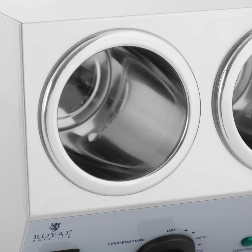 Varmesausflasker, nærbilde av rustfritt stål kammer med synlig temperaturpanel og kontrollknapp.