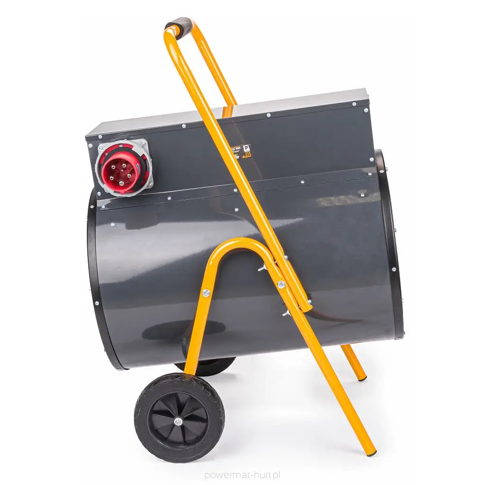 Varmevifte i grått metall, sidevisning med sorte hjul, gult håndtak og rød kontakt tydelig på toppen.