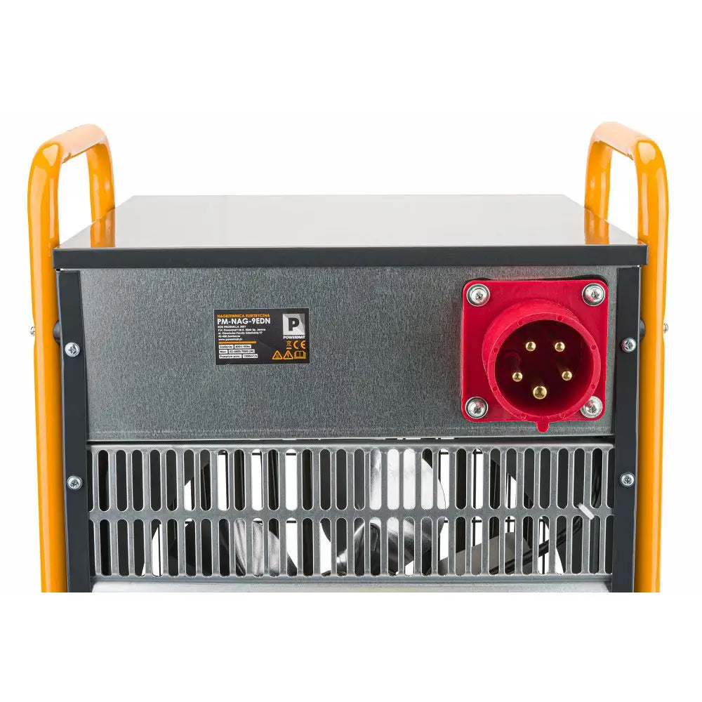 Varmevifte i grått metall, bakside med rødt industrikontaktpunkt, gule håndtak og synlig ventilasjonsgitter.