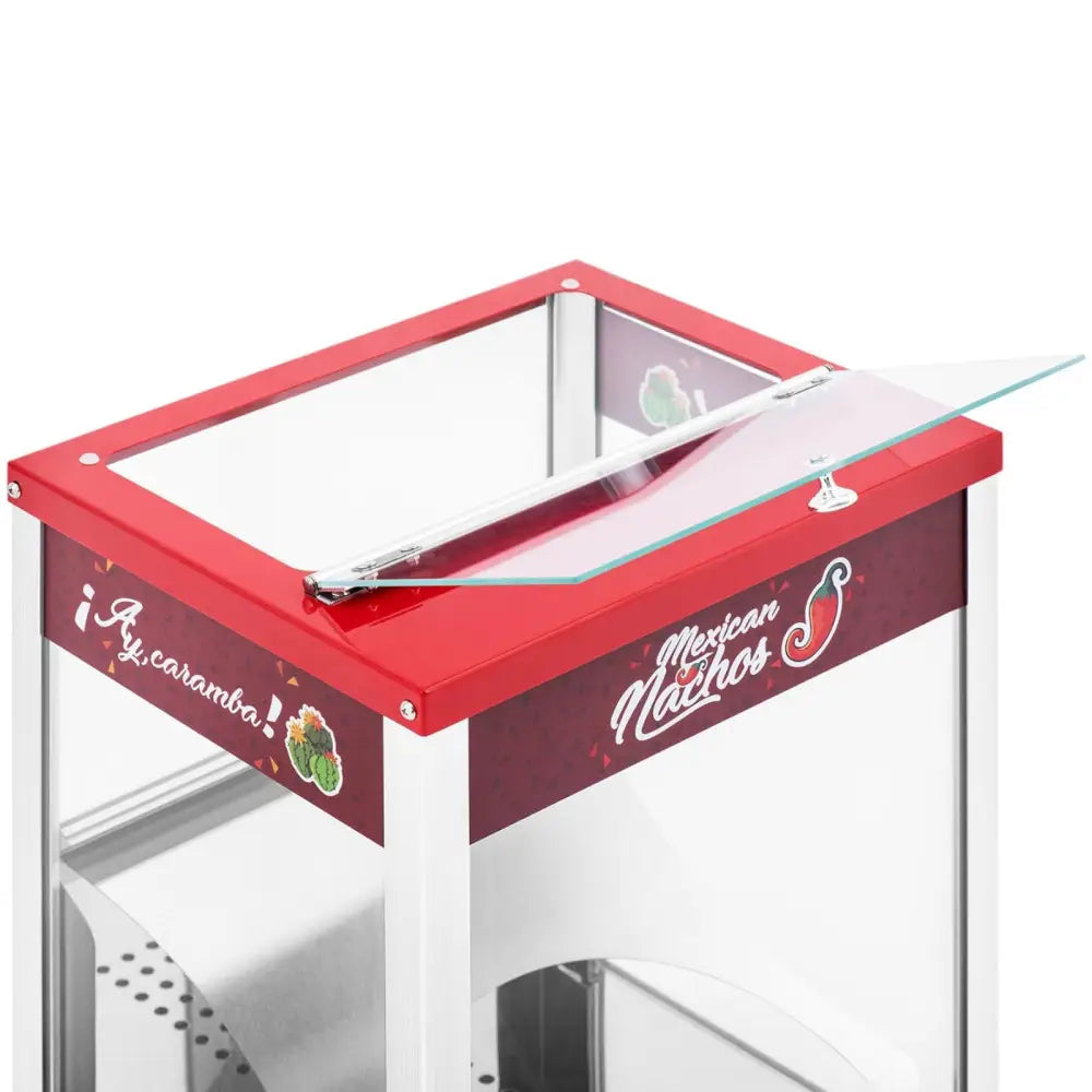 Varmevinduskåpe for nachos og popcorn, rød ramme, åpent glasslokk og chili-dekor sett skrått ovenfra.
