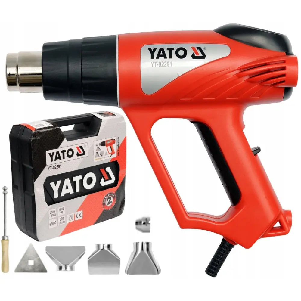 Varmluftspistol fra Yato med rød og svart design, sidevisning med tilbehør og sort koffert.