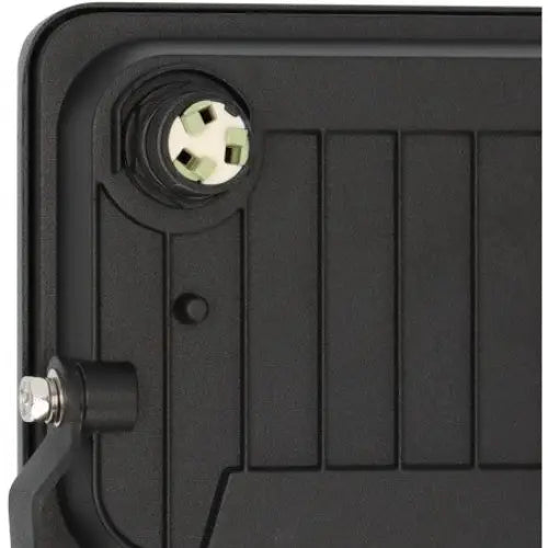 Vegglampe LED JARO, nærbilde av hjørnet med synlig skruefeste og rund kontakt med grønne og hvite detaljer.