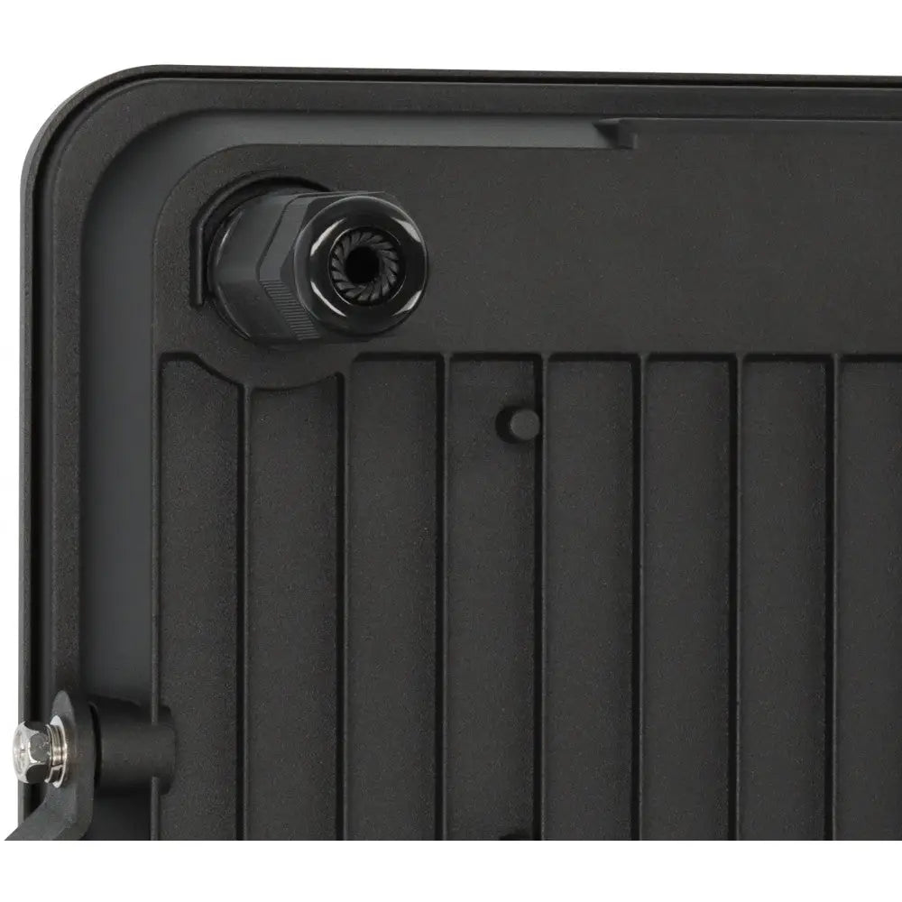 Vegglampe LED JARO 7060 P, nærbilde av svart plasthus med riller, skruekoblingspunkt og metallskrue synlig.