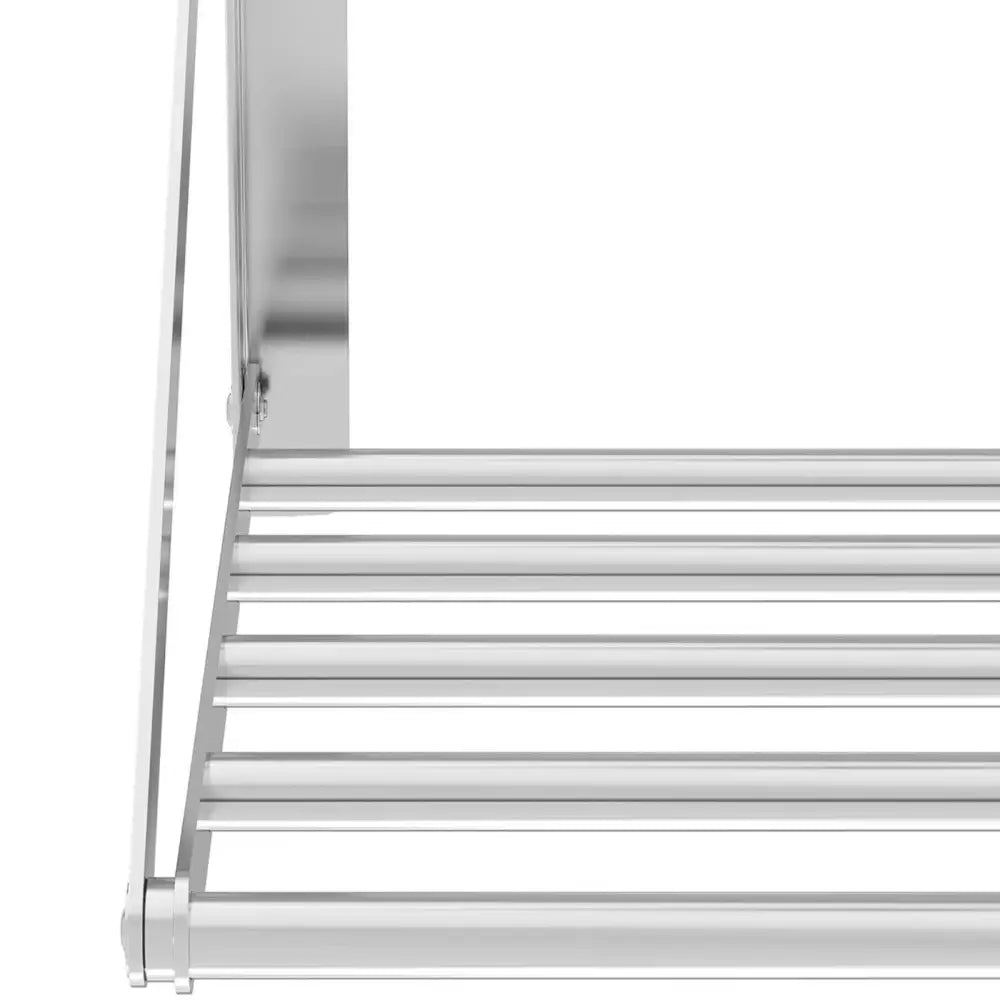 Veggmontert sammenleggbar hylle i rustfritt stål, sidevisning som fremhever blank overflate og robuste stenger.