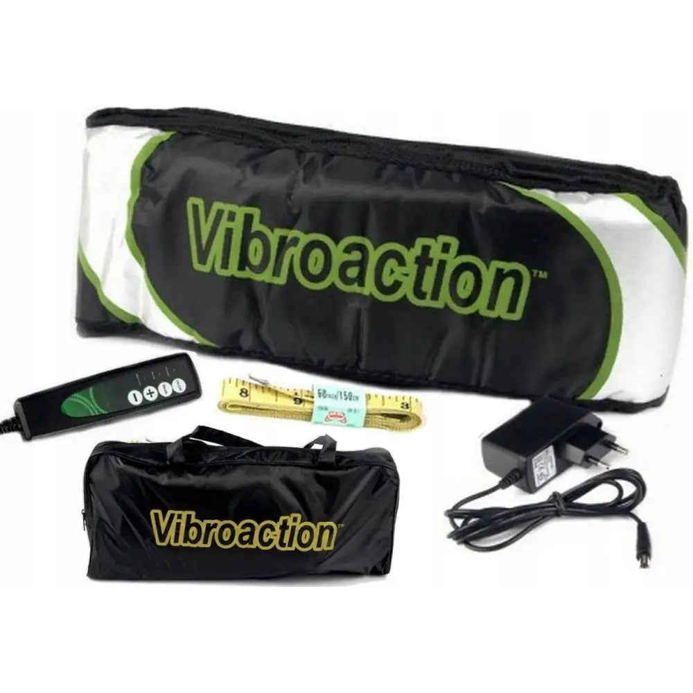 Massasjeapparat vibrasjonsbelte i svart og hvitt, frontvisning med fjernkontroll, målebånd og tilbehør.