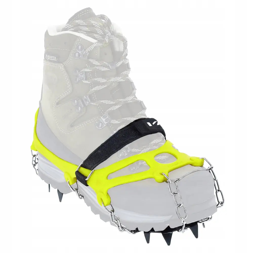 Viking Soltoro turistcrampon, gul elastisk brodd med metallpigger, festet på tursko, sidevisning.