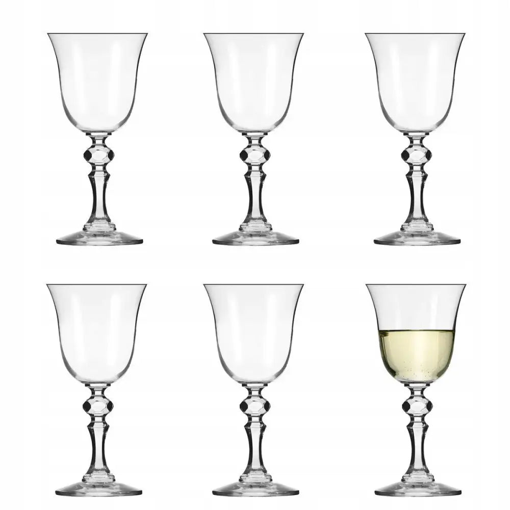 Vinglass for hvitvin Krista, seks glass med fasettert stett, ett fylt med hvitvin, frontvisning.
