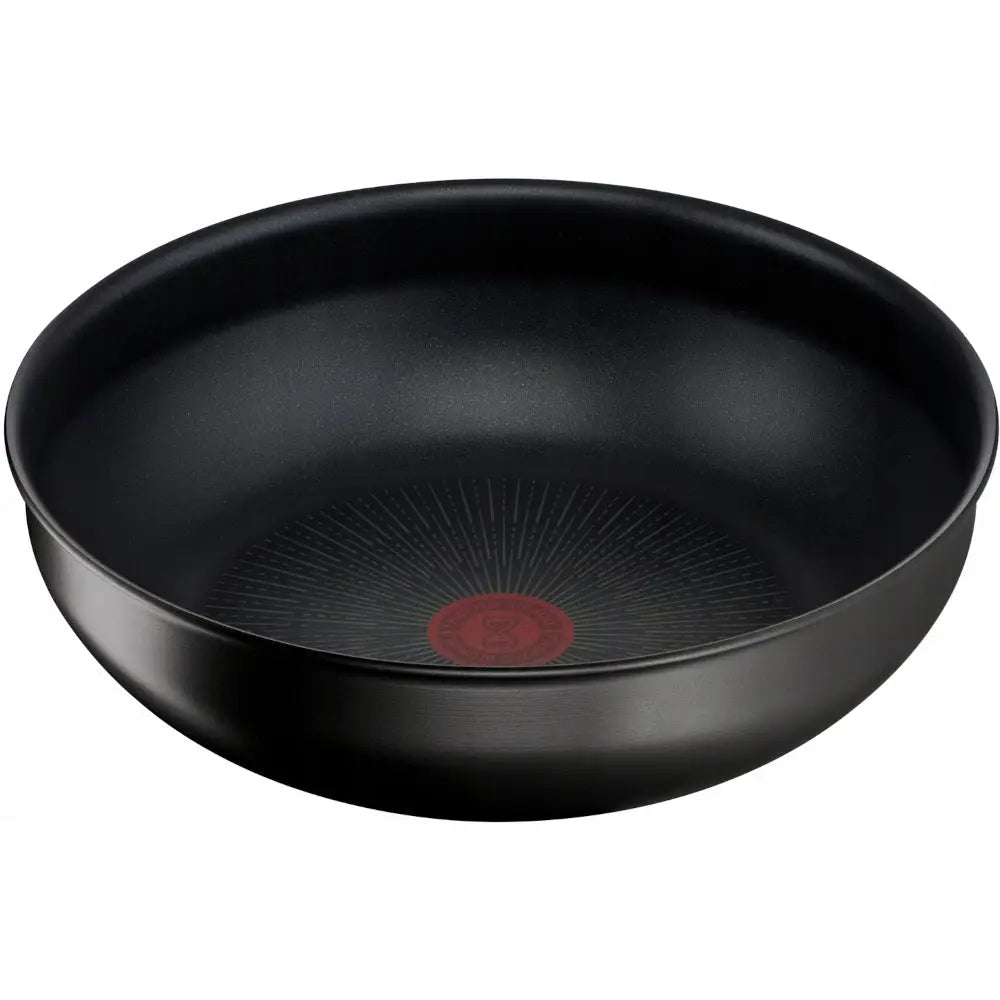 Wok Tefal Ingenio Unlimited 26 cm med sort non-stick belegg, rød mønstret sirkel i bunnen, sett skrått ovenfra.