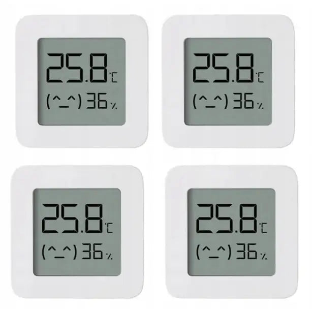 Xiaomi Mi temperatur- og fuktighetsmåler, sett forfra, viser digitale verdier på LCD-skjerm.
