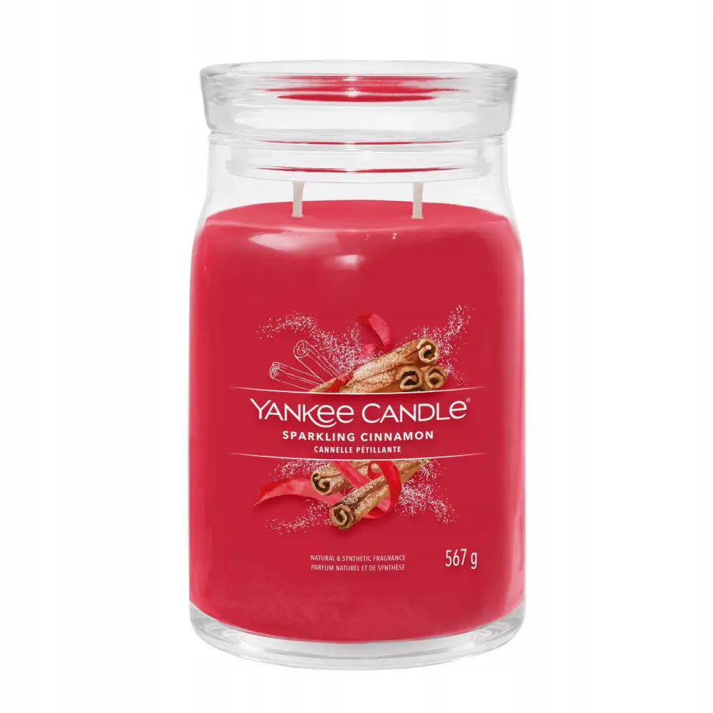 Yankee Candle duftlys Sprudlende Kanel i stor glasskrukke, to veker og etikett med kanelmotiv.