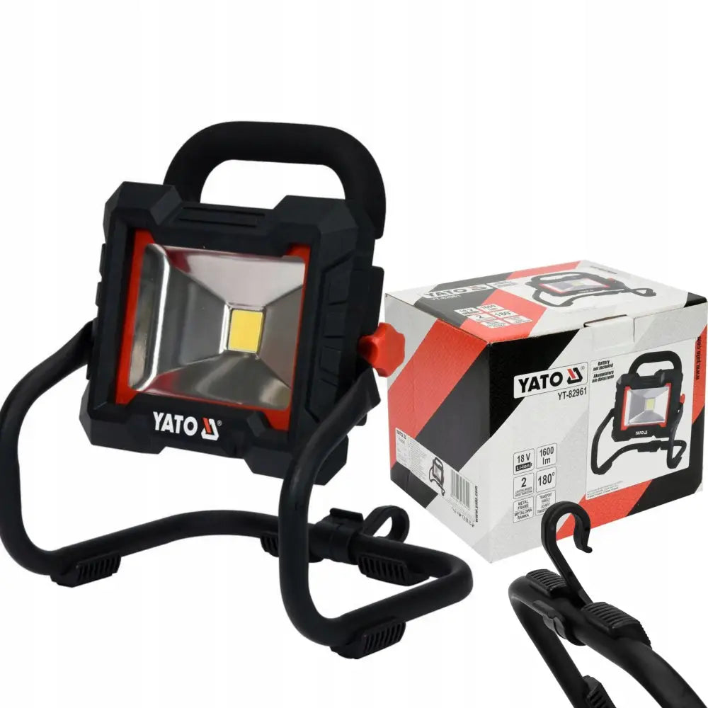 Yato LED-arbeidslampe med reflektor, sort og rød, forfra på stativ, inkludert emballasje og krok.