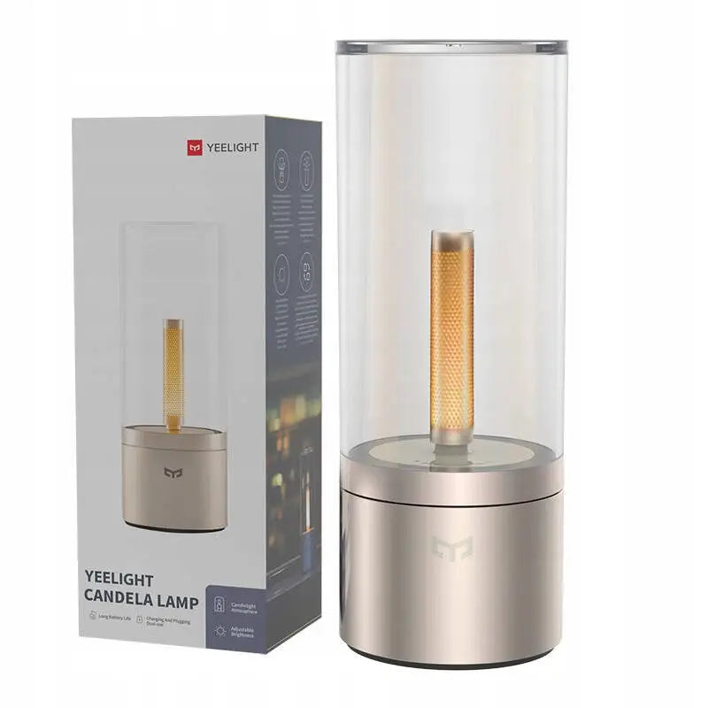 Yeelight Candela USB-C bordlampe i matt gullfarget metall og glass, vist med original emballasje.
