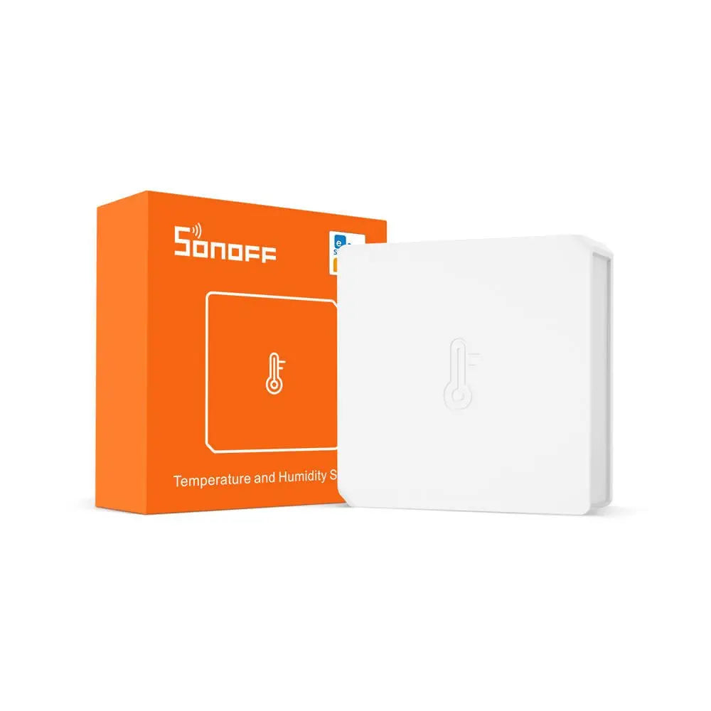 Zigbee temperatur- og fuktighetssensor, hvit firkant med termometersymbol, plassert ved oransje eske.