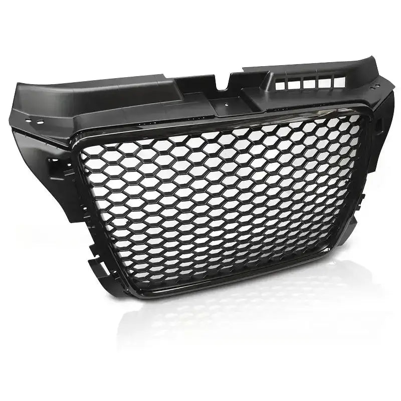 Audi A3 (8P) 03-12 - Deler Og Tilbehør, sort frontgrill med sekskantet nettingmønster og markert plaststruktur.