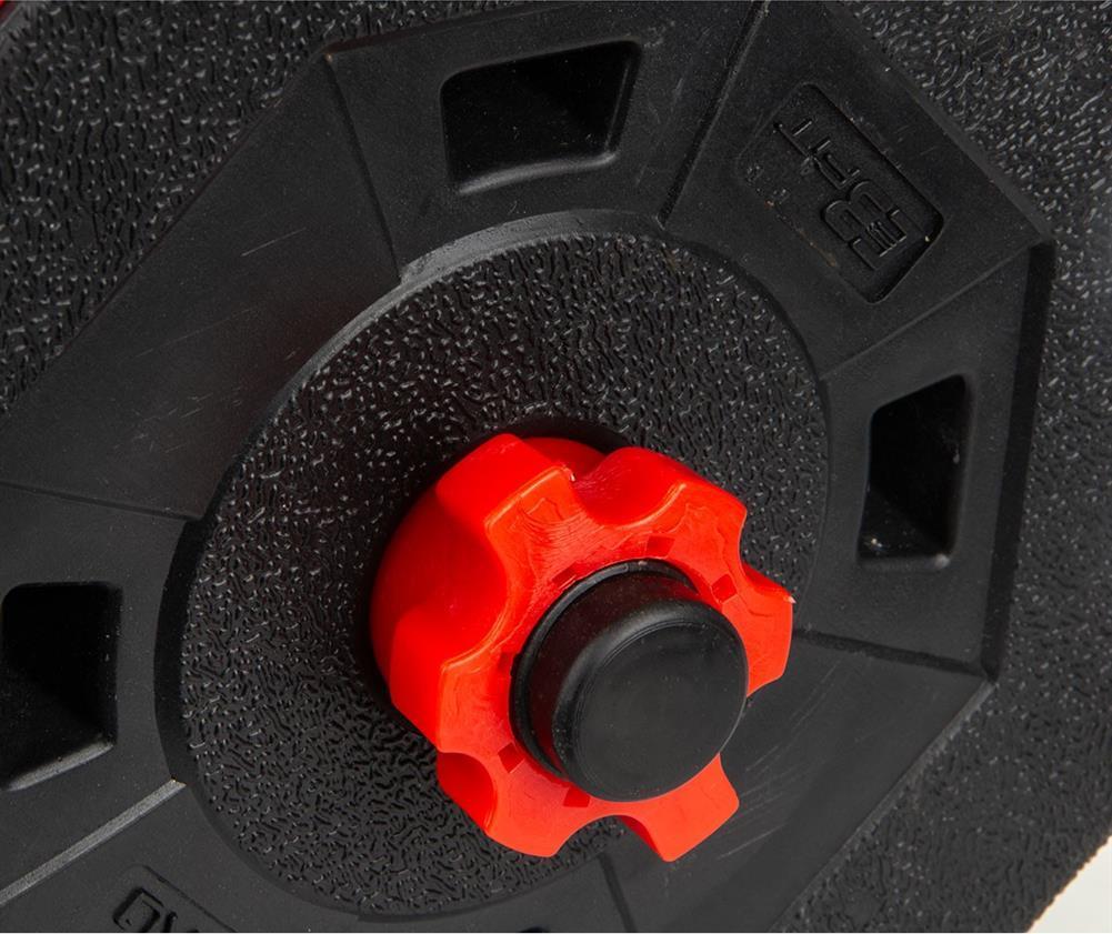 Manualer sort vektplate i plast med rød låsemutter, nærbilde som viser tekstur og låsemekanisme tydelig.