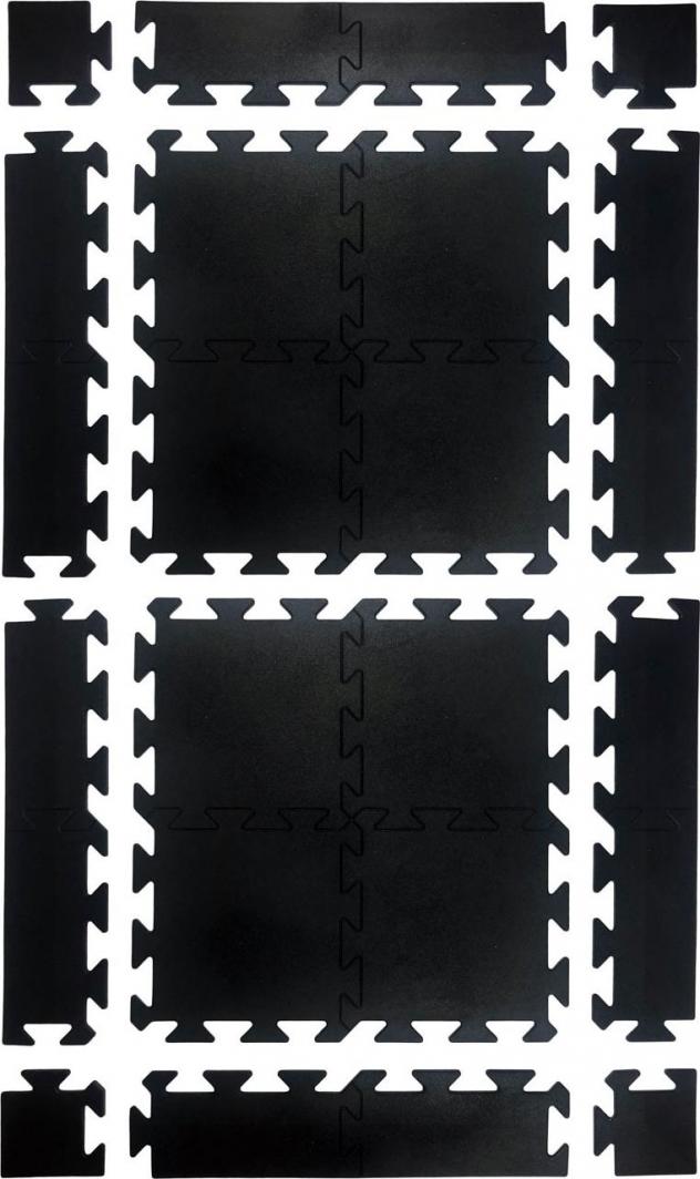 Gummimatte puslespill i svarte, firkantede plater med tydelige sammenkoblinger og kanter, sett ovenfra.
