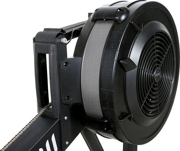 Romaskin med synlig luftmotstandshjul, håndtak og justering, detaljert sidebilde av konstruksjon og ventilasjonsgitter.