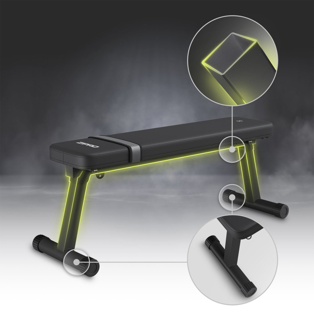 Sammenleggbar Treningsbenk i svart metall med polstret overflate, forsterkede rør og rillede endestykker.