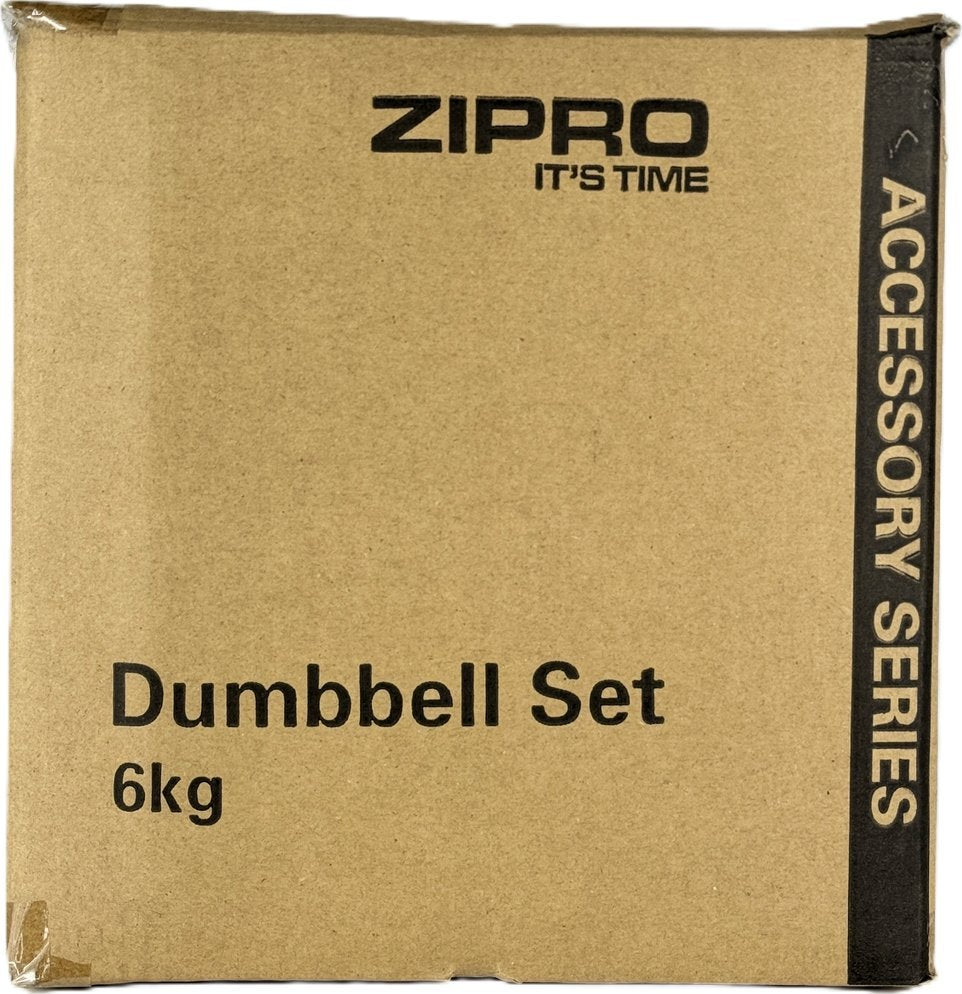 Manualer Sett brun pappeske med svart trykk, produsent, produktnavn og vekt synlig på forsiden.