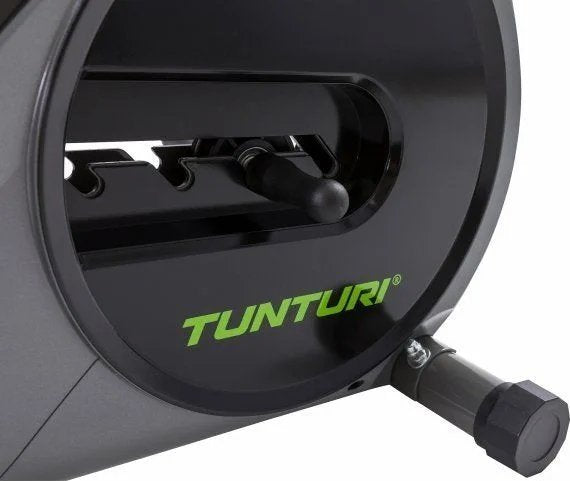 Romaskin Sammenleggbar, svart plastdeksel med grønn logo, metallspak for justering og synlig skrue nederst.