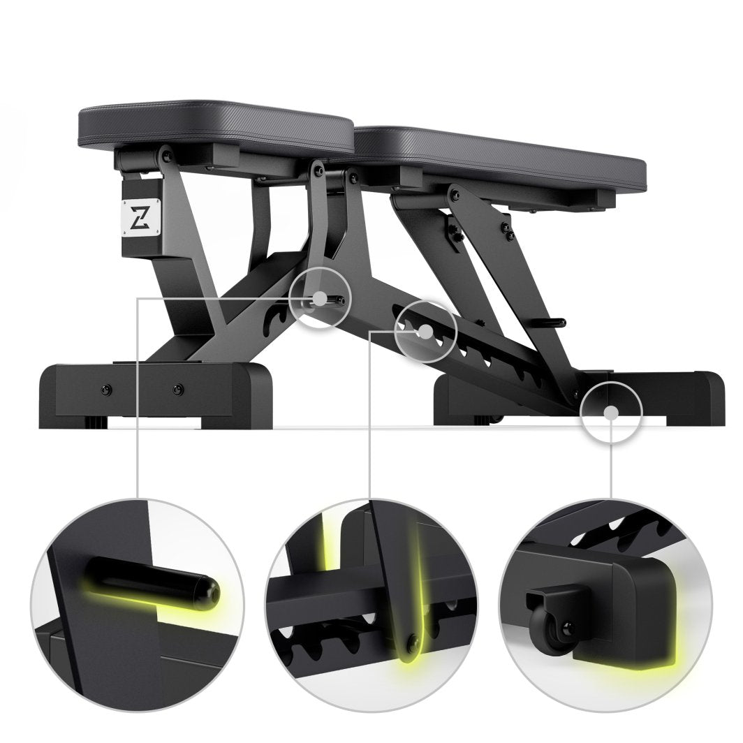 Treningsbenk Justerbar i sort metall med polstret sete og rygg, sett fra siden med synlig låsemekanisme og hjul.