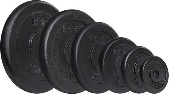 Vektplate i sort støpejern, fem stablede skiver med 31mm hull og tydelig vektmerking, sett fra siden.