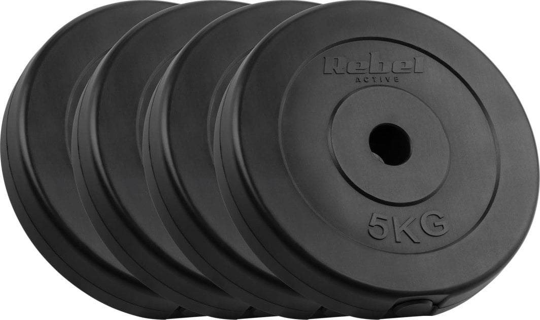 Vektskiver i sort bitumen, fire stykker på rekke med 31 mm hull og tydelig 5 kg-markering, sett fra siden.