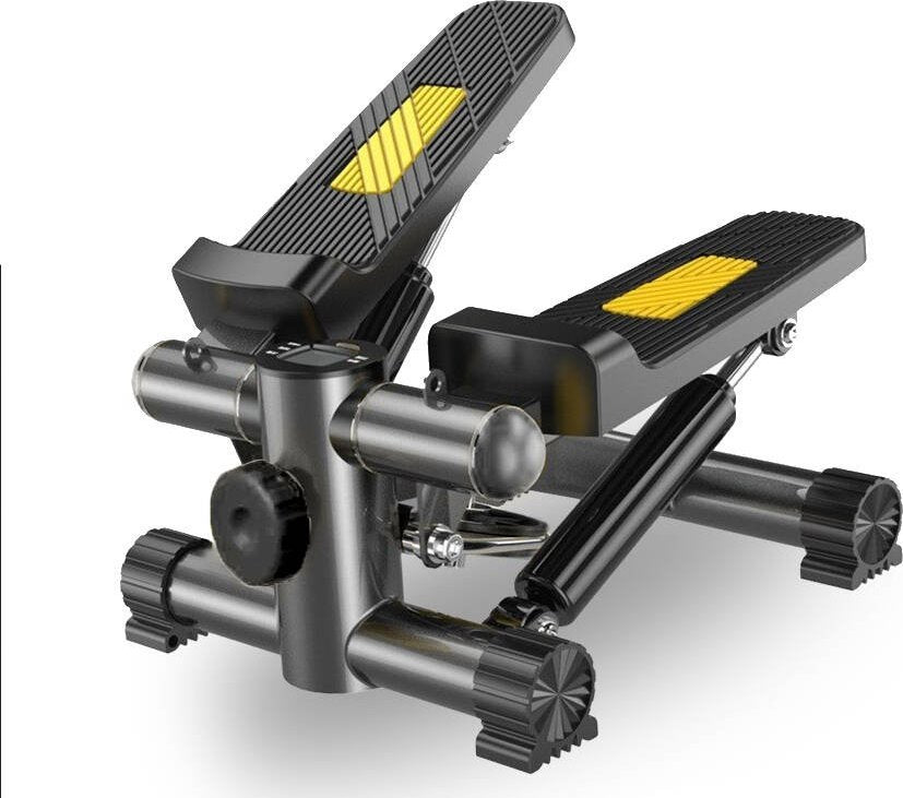 Mini Stepper i sort metall med gule detaljer, strukturert base og LCD-teller, sett fra skrå vinkel.