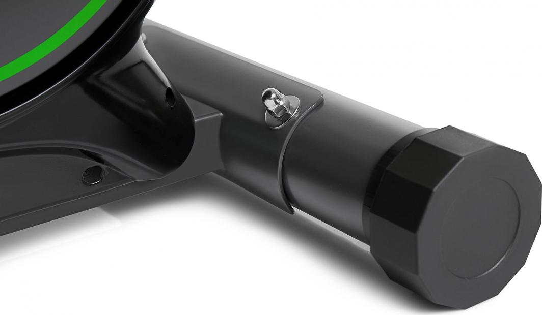 Ellipsemaskin med sort metallfot, sekskantet ende og sølvfarget skruknott, grønn kantdekor vises.