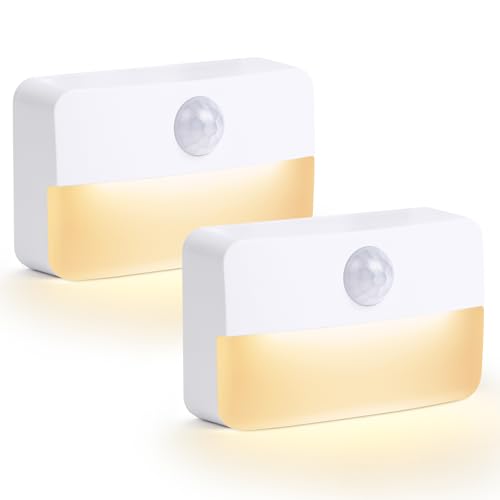 Nattlampe Barn, to hvite rektangulære nattlamper med sensor øverst og varmt lys nederst, sett skrått forfra.