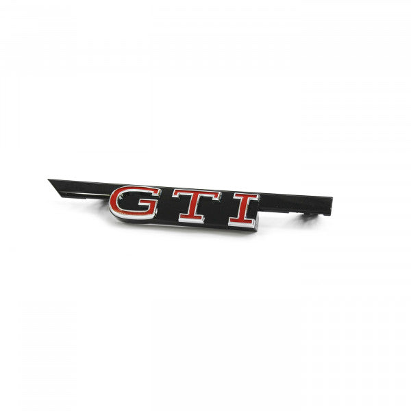 Originalt emblem til Vw Golf 8 (5H) GTI i Glossy Chrome, Black Glossy og Tornado Red for frontgrill