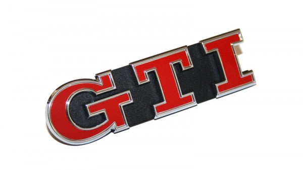 Emblem/logo til Vw Golf VII GTI / Special Chrome / Tornado Red i Satin Black, original Volkswagen del til front grill