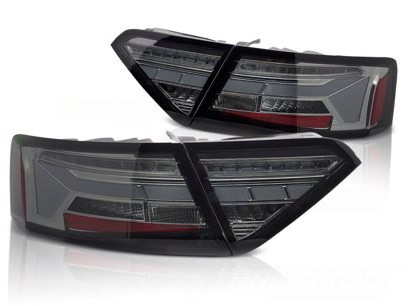 Baklykter LED Bar Smoke Sequential til Audi A5 11-16 OEM Bulb sett rett bakfra på hvit bakgrunn.