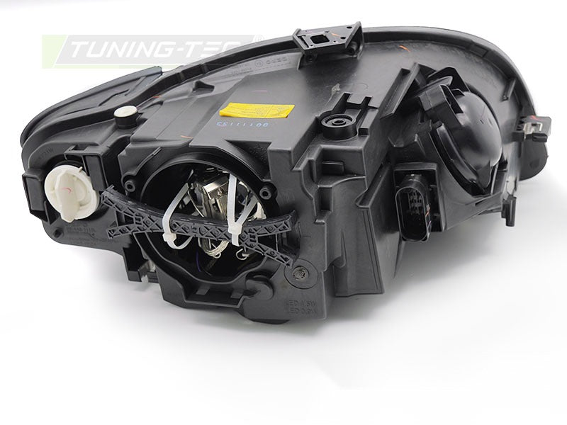 Frontlykter Audi A4 B7 04-08 med festedetaljer og kontakter.